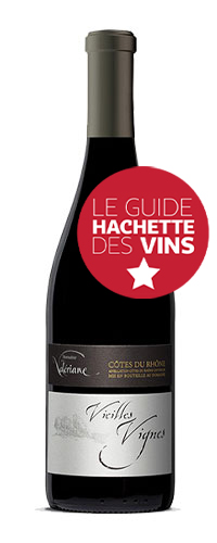 Domaine de la Valériane. Côtes du Rhône Rouge vieilles vignes. La robe est brillante, d’un beau rouge cerise, les arômes de fruits mûrs et de griottes se mêlent à des saveurs d’épices. L’attaque est ronde avec des tanins très présents, fins et charnus, on retrouve en bouche des notes d’épices avec une belle persistance aromatique.